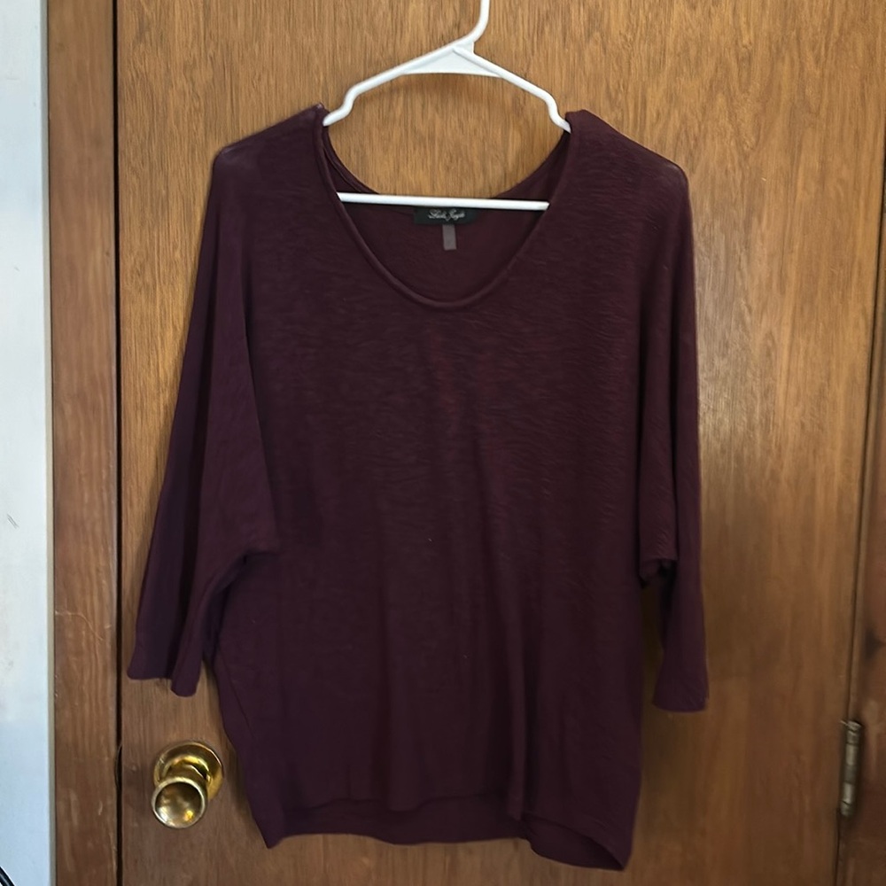 Soft, dark purple pullover sweater/blouse. 3/4 sleeves. Very comfy